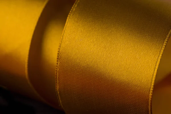 Soft abstract image of shiny gold ribbons — 스톡 사진