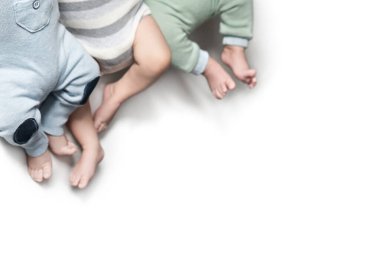 triple. multiple pregnancy, newborn babies. twins brothers. Isolate. Copy space clipart