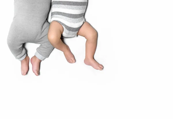 Feet of twins newborns, brother and sister, multiple pregnancy. — Stock Photo, Image