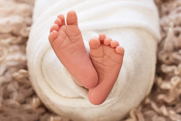 Foot of the newborn baby, tenderness. copy space in winter concept — Stock Photo, Image