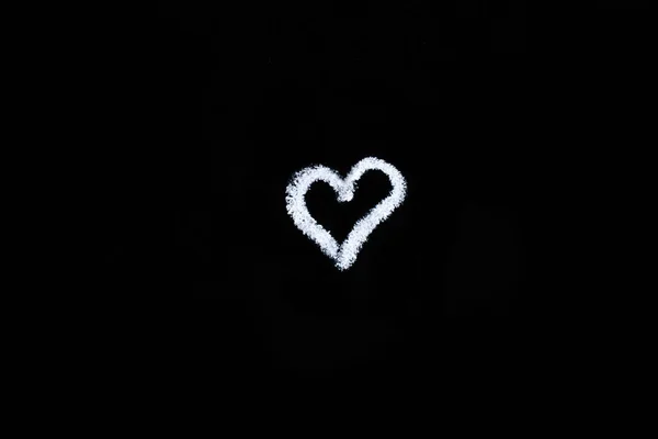 hand drawn heart with arrow on black chalk board. copy space. valentines day, all lovers concept