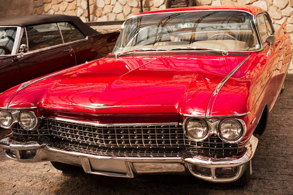  Yalta, Russia, July 2019. Cadillac Deville Coupe 1959. Vintage car. Part of beautiful red car