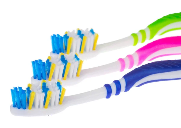 Drei neue Zahnbürsten — Stockfoto