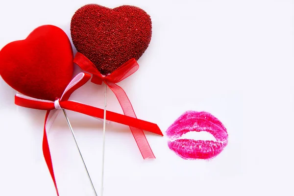 Two red hearts and red lipstick kiss on white background, love letter. — Stock Photo, Image