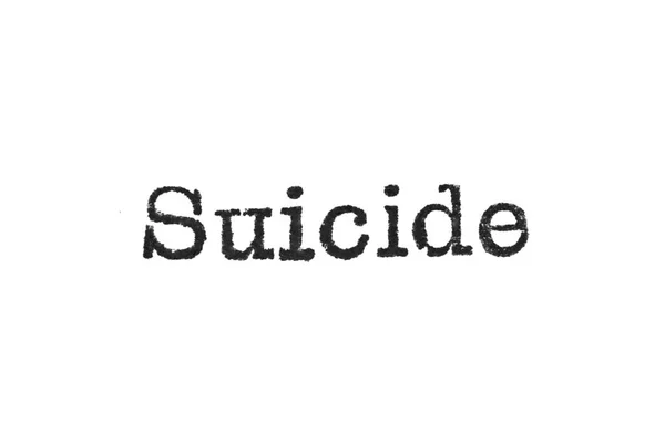 The word "Suicide" from a typewriter on white — Stock Photo, Image