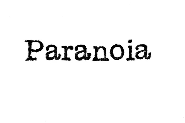 La palabra "Paranoia" de una máquina de escribir sobre blanco —  Fotos de Stock