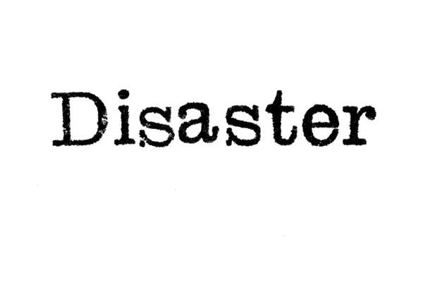 Cuvântul "dezastru" de la o mașină de scris pe alb — Fotografie, imagine de stoc