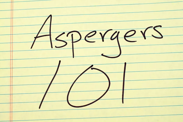 Aspergers 101 en una almohadilla legal amarilla — Foto de Stock