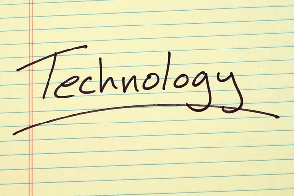 Technology On A Yellow Legal Pad — Stock Photo, Image