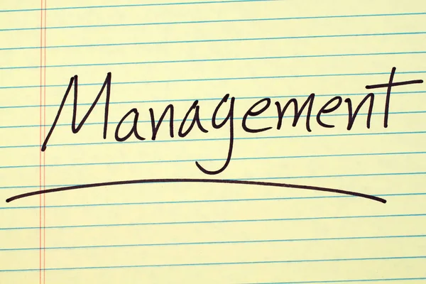 Management On A Yellow Legal Pad