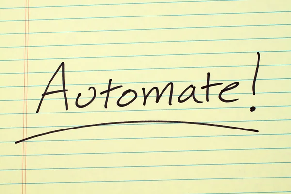 Automatizujte! Na žlutý právnický blok — Stock fotografie