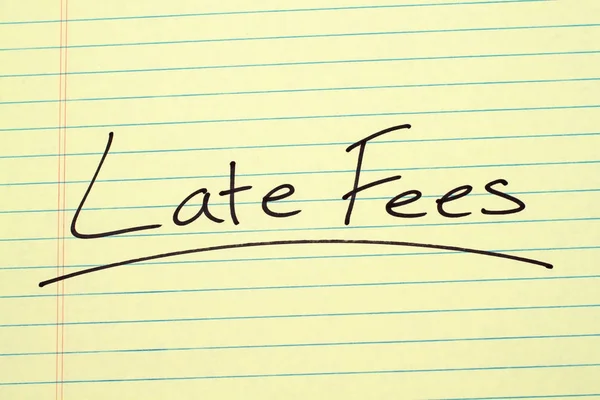 Late Fees On A Yellow Legal Pad