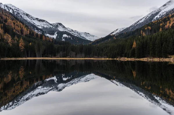 Mountains mirroring in the crystal clear waters of the Ingeringsee