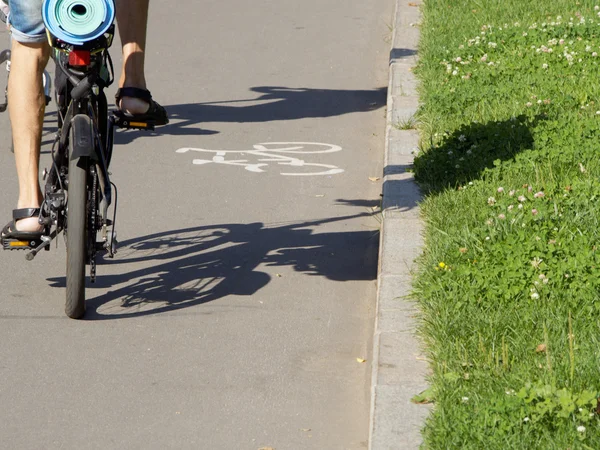 Cyclist and his shadow — Stock Photo, Image