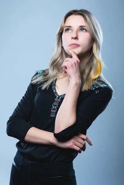 Closeup portrait of a girl, on an isolated gray background. Human face expression, emotions, feeling attitude reaction — Stock Fotó