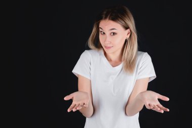 Closeup portrait of a girl, on an isolated gray background. Human face expression, emotions, feeling attitude reaction