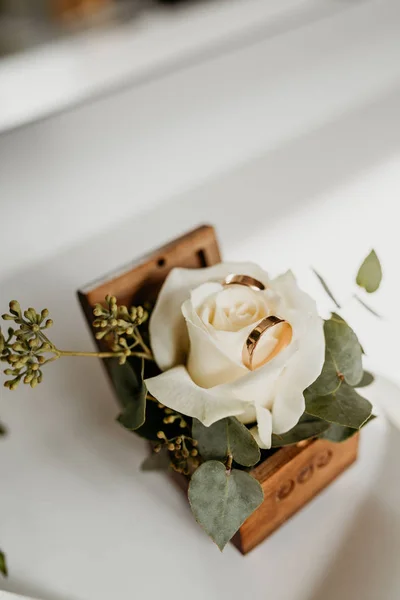 Beautiful wedding rings box with white roses