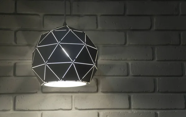 Lamp on the background of a white brick wall. loft style — 图库照片
