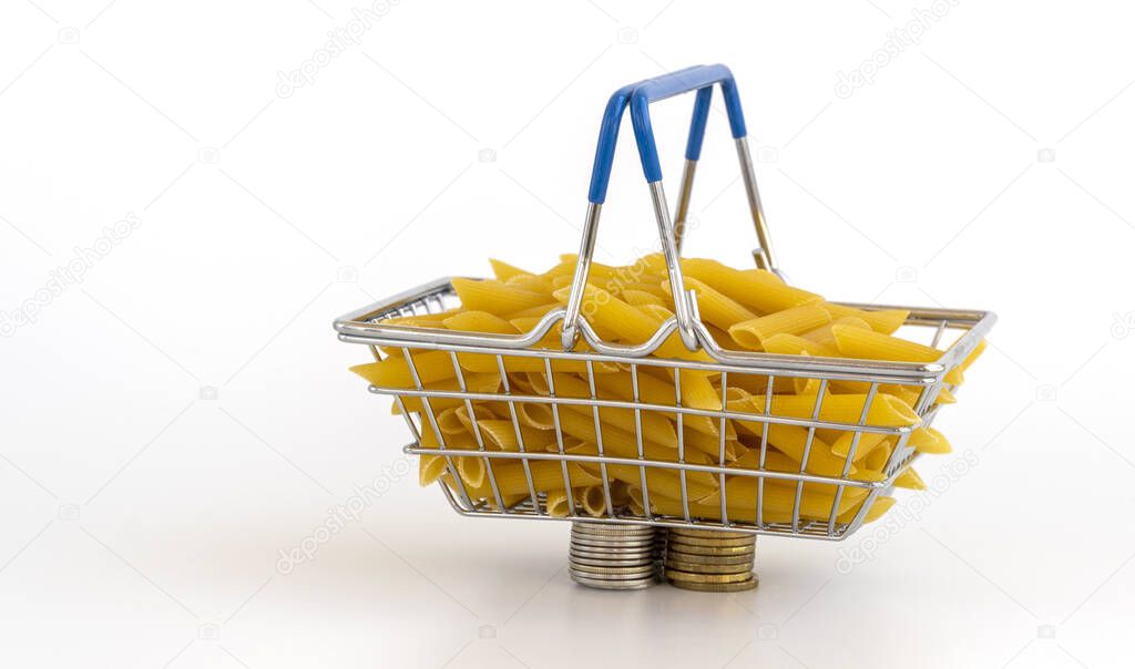 the noodles in the shopping basket. increase in pasta products prices. financial crisis, inflation due to the quarantine pandemic coronovirus COVID-19.