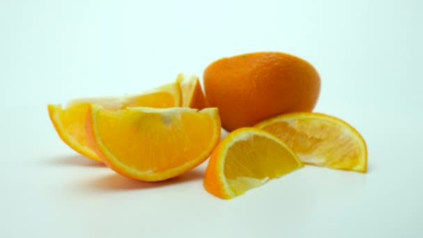 Orange Slices Spin White Background Slight Blur 360 Rotation — Stock Video