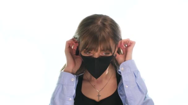 Masked girl on a white background — Stock Video