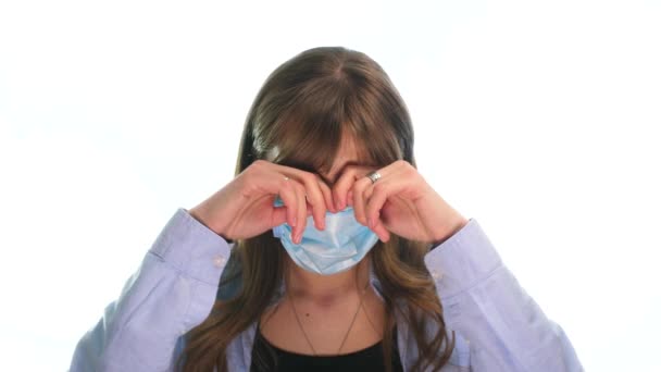 Masked girl on a white background — Stock Video