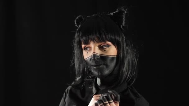 Menina em maquiagem preta — Vídeo de Stock