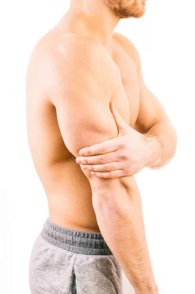 Homem com dor tríceps sobre fundo branco — Fotografia de Stock