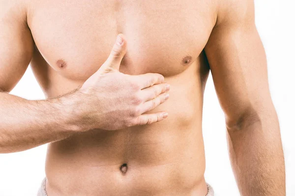 Musculoso joven aislado sobre fondo blanco . — Foto de Stock