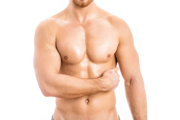 Muskulöser junger Mann isoliert auf weißem Hintergrund. — Stockfoto