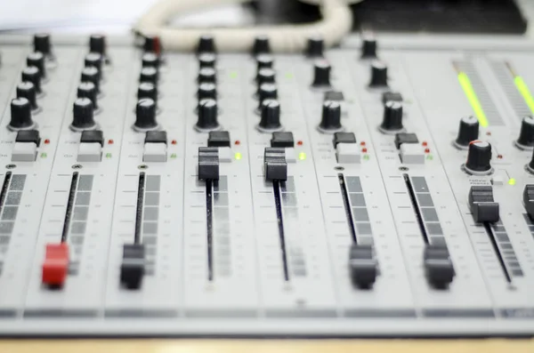 Radio station. Professional multitrack mixing console in the control room.