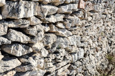 Taşlardan yapılmış eski duvarın yakın plan görüntüsü