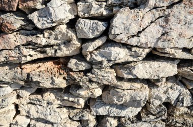 Taşlardan yapılmış eski duvarın yakın plan görüntüsü
