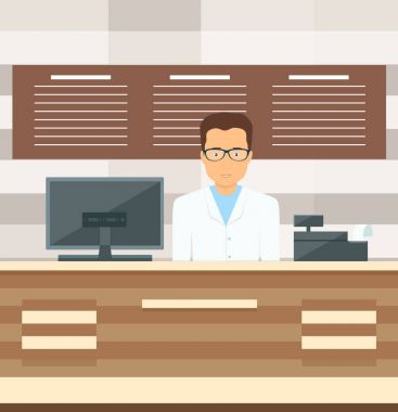 Adam satıcı mağaza yazarkasa duruyor.