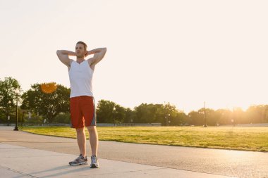 Handsome Caucasian man portrait while resting during a workout outdoors at the National Mall in Washington DC