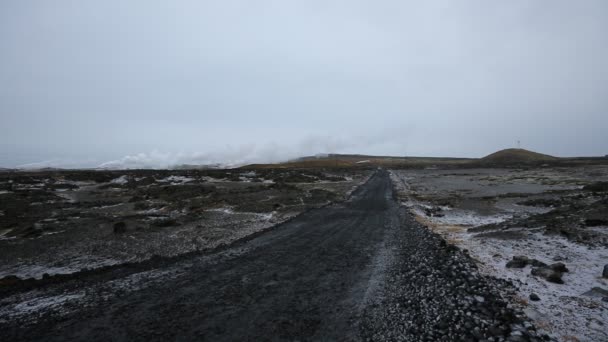 Road through geothermal area — Stock Video