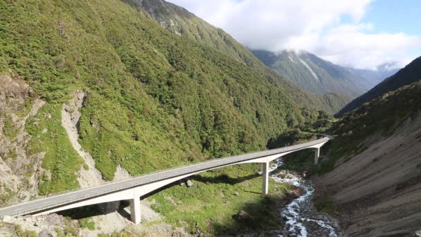 White car driving Otira viaduct — Stock Video