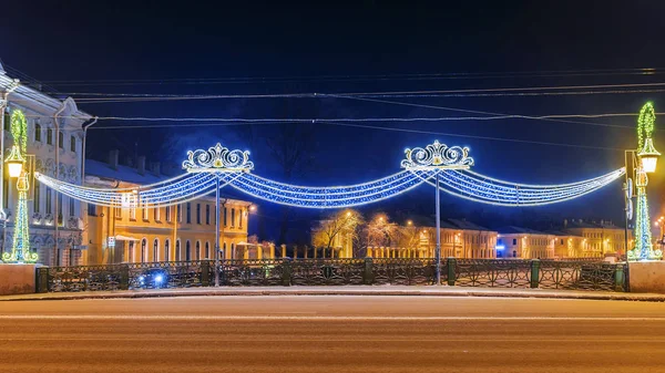 Christmas St. Petersburg. Decoration Green Bridge over the River