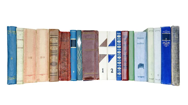 Buchrücken alter Bücher auf weißem Hintergrund — Stockfoto
