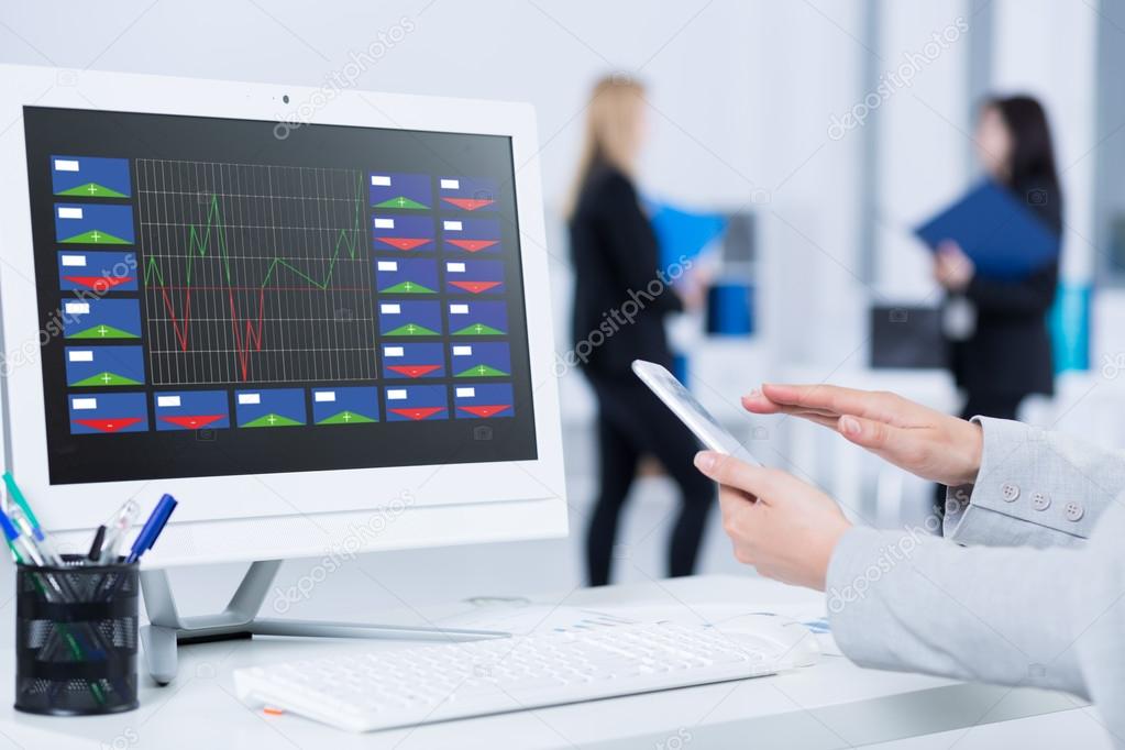Stock Broker At Her Computer Desk Stock Photo C Photographee Eu