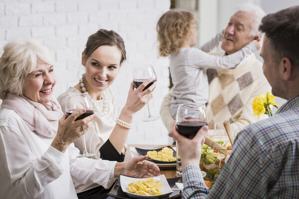 Family raising glasses in a toast