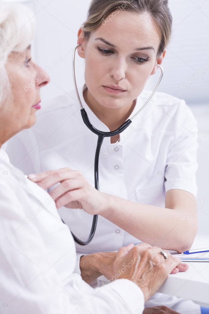 Doctor making the medical examination Stock Photo by ©photographee.eu