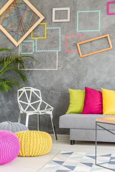Living room with colorful frames — Stock fotografie