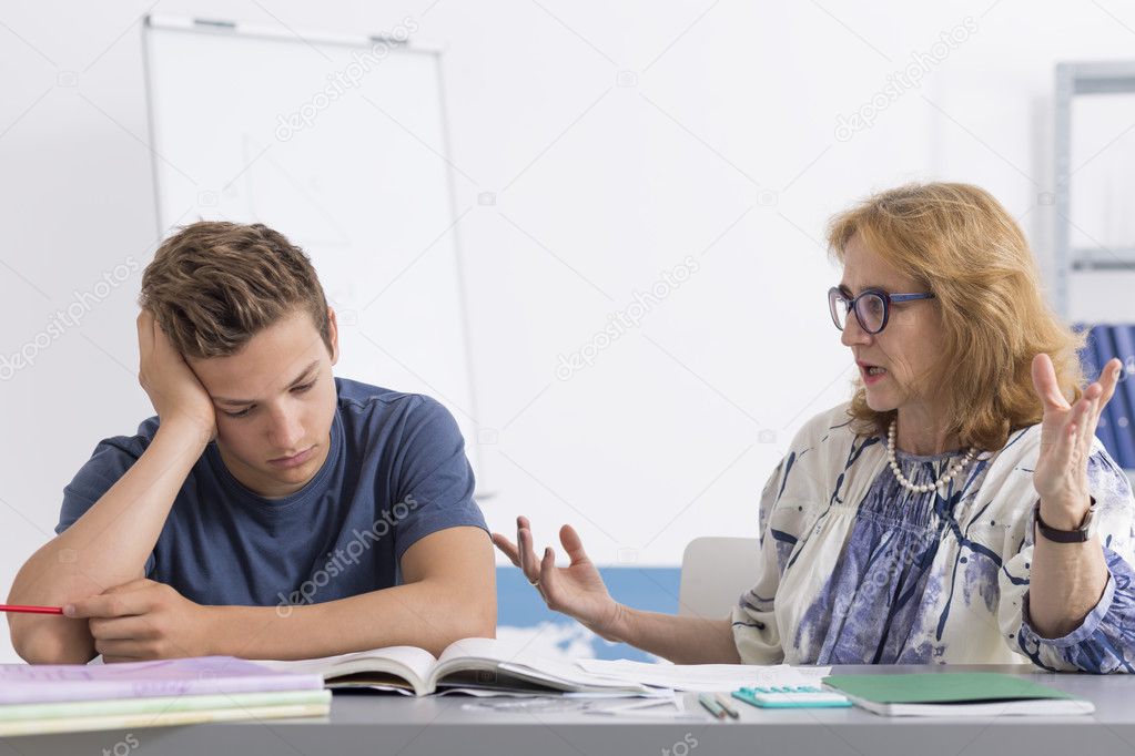 Difficult teenage student and teacher