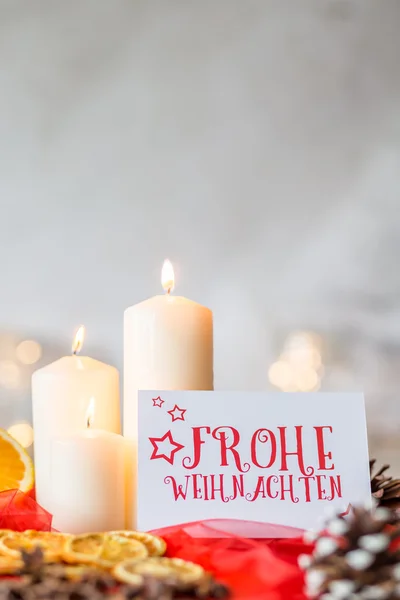 White candles and christmas card — Stock Photo, Image