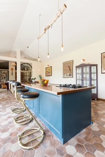 Old-fashioned kitchen with blue furniture — Stock Photo, Image