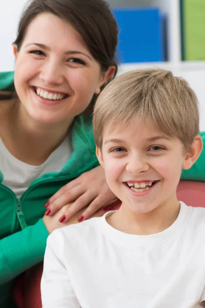 Small boy and his physiotherapist — Stock Photo, Image