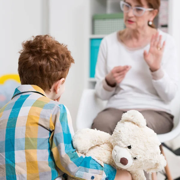 Pedagogue talking with a child — Stock Photo, Image
