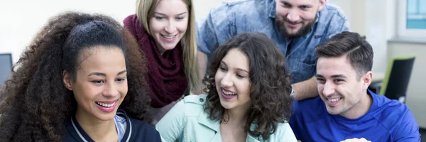 Happy students spending time together — Stock Photo, Image