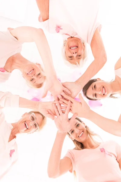 Women holding each other hands — Stock Photo, Image